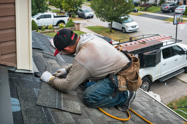 Professional Roofing technician working in Aurora, NY